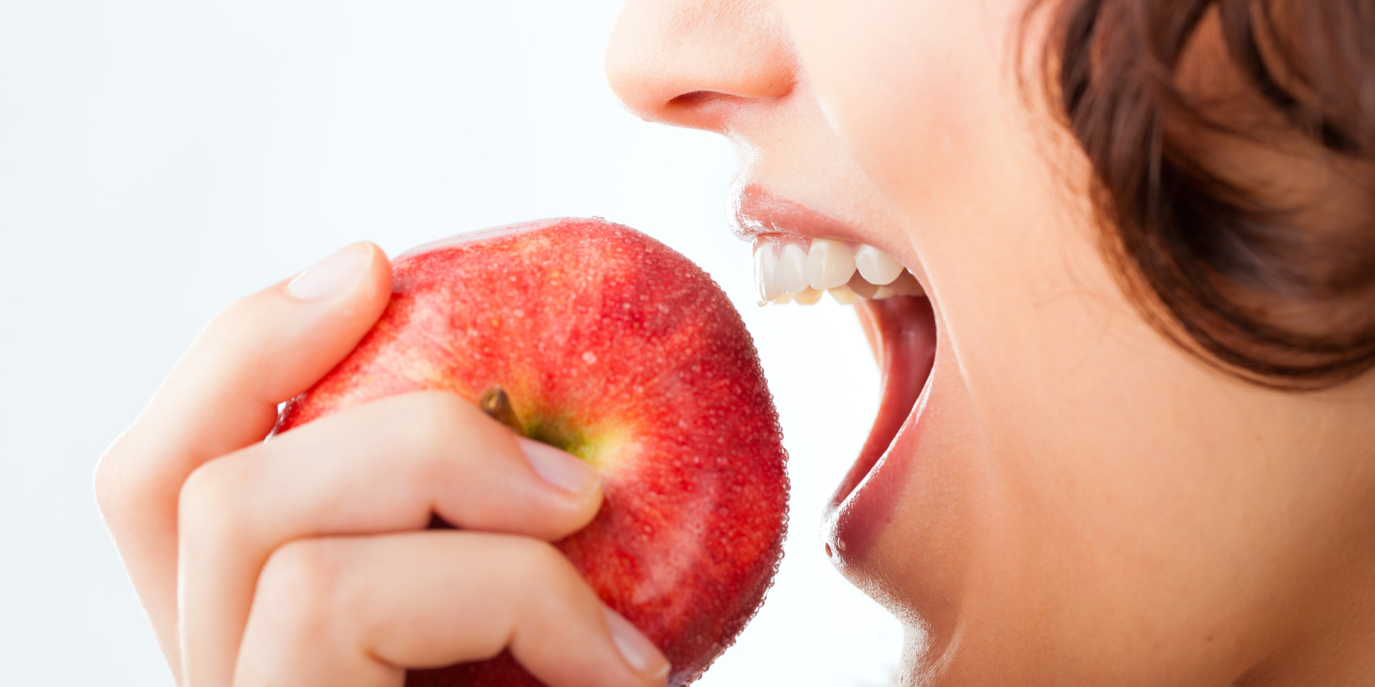 biting an apple